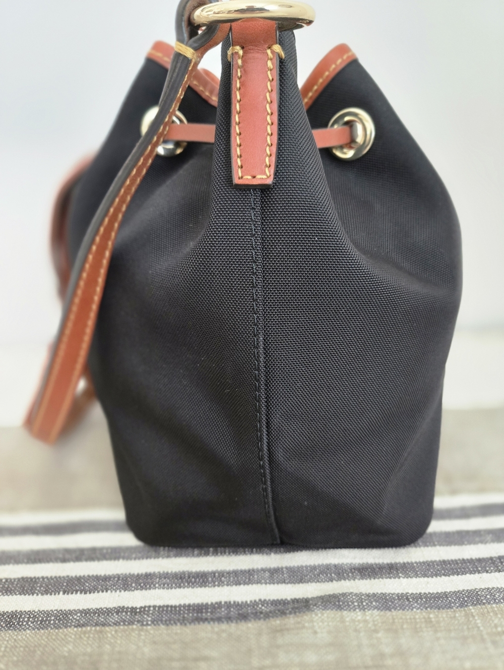 Dooney & Bourke Black Nylon Bucket Bag with Brown Trim and Tassels - Picture 11 of 16